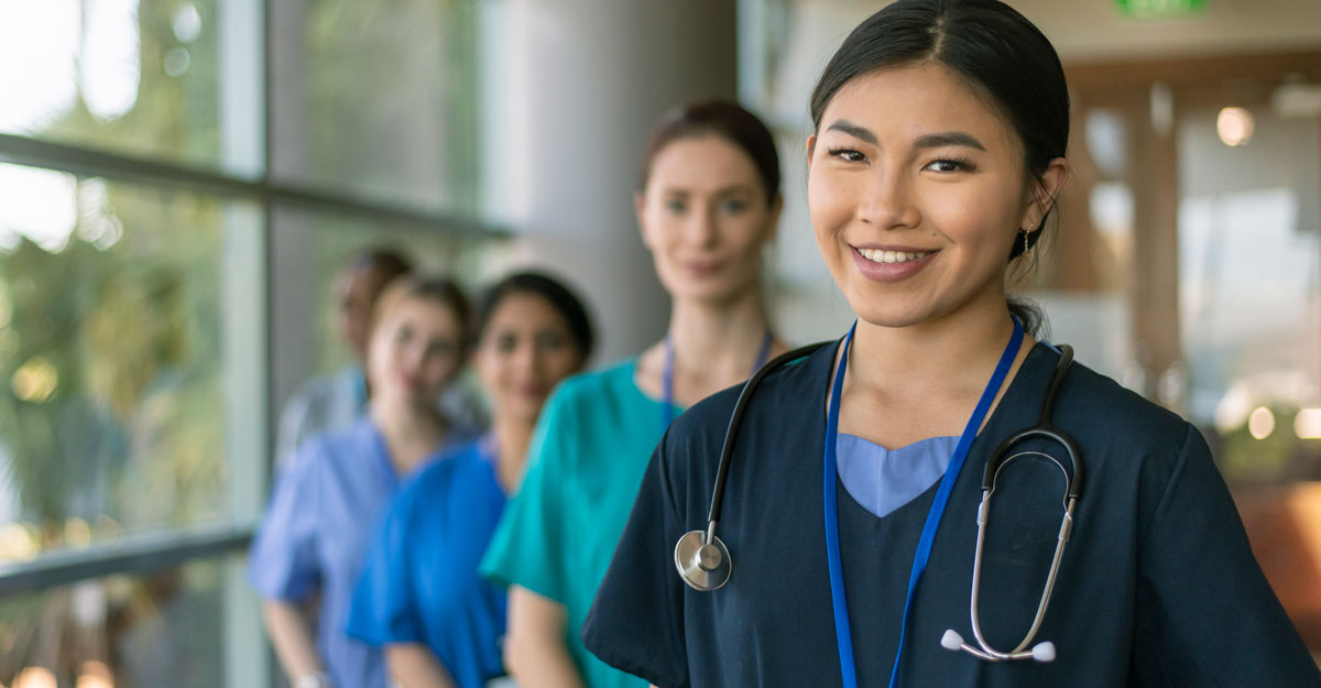 nurses stand together