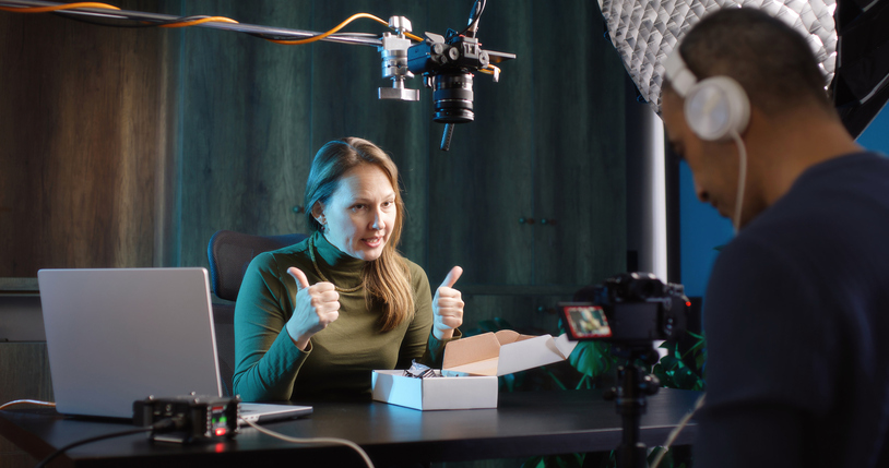 Radio host reading out an ad for sponsored content.