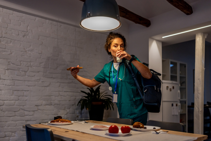 Nurse eating while considering offers after successful Gen X marketing in healthcare