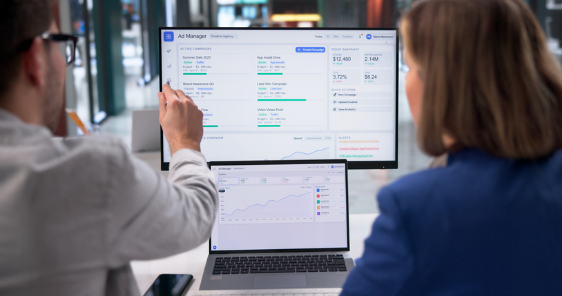 Marketers going over the results of a programmatic advertising campaign